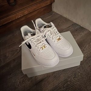 Size 6.5 Women white and black Nike Air Forces